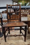 A period oak spinde back chair having solid seat and turned frame