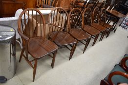 A set of six (four plus two) dark stained Ercol style kitchen dining chairs