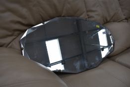 A vintage frameless mirror, width approx. 69cm