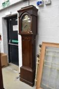 A late 18th Century oak cased long case clock having 8 day movement with 30cm brass face, recessed