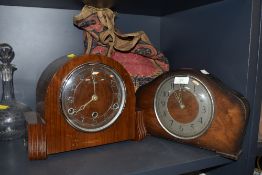 Two vintage Bentima wooden mantel clocks and a bag of clock components.