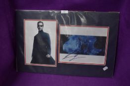 A signed matrix photo.
