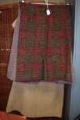 Four vintage 1950s and 1960s wool skirts and a dress, including Harris Tweed,all good condition,