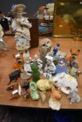 A selection of figures and figurines including elephants and owl
