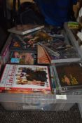 A large quantity of Cds and DVDs, a mix of genres and interests.