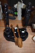 A selection of wood treen items including two tribal African figures and ebony dressing set