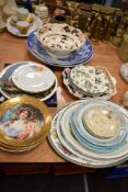 An assortment of vintage and modern plates, including Royal Worcester and more.