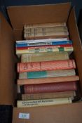 Two mixed boxes of books, including novels, guides and more.