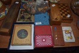 A selection of card games and puzzles including wooden chess set