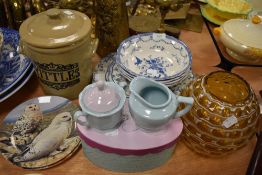 A selection of blue and white plastic bowls and plates,a boxed sugar and creamer, a stoneware lidded