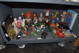 A selection of childrens toys and games including Camberwick green, Disney and Smurfs
