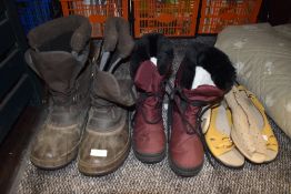 A selection of snow boots and ladies shoes