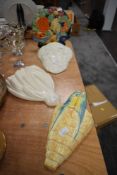A selection of wall hanging ceramics and wall pockets of art deco design including Sylvac and