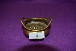 A bronze Chinese incense bowl having six character mark to underside and embossed depiction of scene