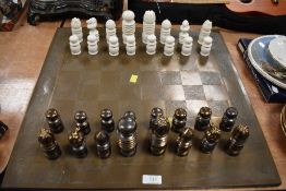 An unusually designed chess set with Bauhaus or art deco design ceramic with white and lustre glazes