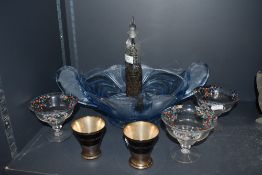 An assortment of vintage and antique items including early 20th century dressing table decanter or