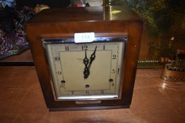 An art deco mantle clock retailed by the Goldsmiths London, with presentation plaque for Imperial