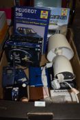A mixed lot containing two Haynes manuals, a table lamp, Autobridge and card games and more.
