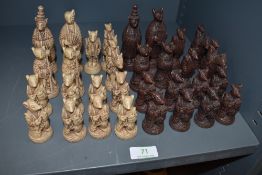 A set of chess pieces in the form of rats.