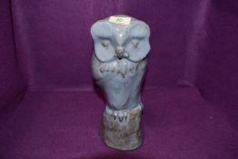 A studio pottery figure of and owl by David Sharp of Rye in a blue slipway glaze