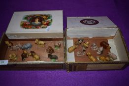 A collection of twenty Wade whimsical animals in Cigar boxes, including Rabbits, dogs elephants