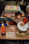 A quantity of vintage board games and toys amongst which are a cloth bodied monkey,scrabble and go