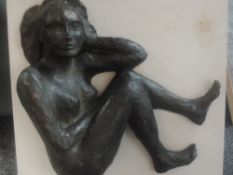 A cast sculpture attributed to Michael Jenkins, crouched nude, 53 x 48cm