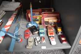 Two early Dinky diecasts, Rover 75 in burgandy and Triumph in grey along with modern Matchbox and