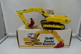A 1:35 scale NZG Modelle diecast, JCB Crawler Excavator 807 in original box 141