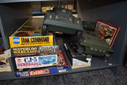 A shelf of Military related Games and Toys including Tank Command, Waterloo Wargame, Colditz,