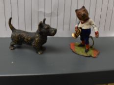 A vintage lead painted miniature figure of a Bear having sprung head with Trumpet along with a