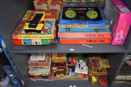 Two shelves of mixed vintage Toys & Games including Double Your Money, Careers, Halma, Solitaire,