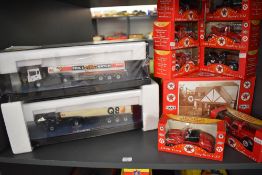 A shelf of modern diecasts including two Corgi 1:50 scale Fuel Tankers, Q8 & Esso along with