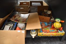 A shelf of vintage Toys and Games including Shuttle-Ball Game, Triang Beaufort Castle, miniature