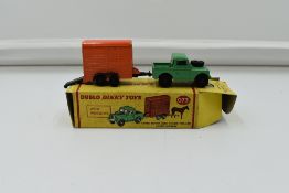 A Dublo Dinky diecast, Land Rover and Horse Trailer, with horse, Green Land Rover with Orange