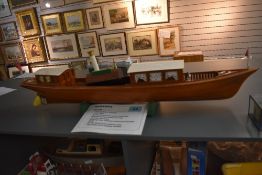 A wooden scratch built radio controlled model, Thames River Launch Boat named Marinda having