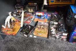 A shelf of modern toys including Corgi, Micro Machines, Konami Alien figures etc, all boxed