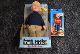 A 1992 Matchbox Home Alone 2 Talking Kevin doll and a 1991 THQ Home Alone Screaming Kevin doll, both