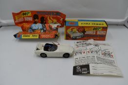 A Corgi diecast, James Bond Toyota 2000GT, in white with black interior, with bandit and driver