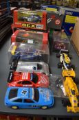 Ten Hornby, Matchbox and similar Scalextric Cars including Porsche 959 BP, Subaru, Opel etc and a