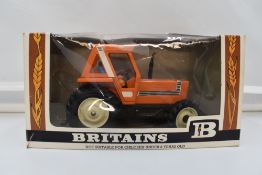 A Britains 1:32 Scale metal and plastic model, Fiat Tractor, in original window box 9528