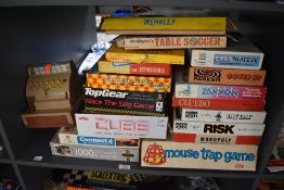 A shelf of mixed vintage Toys and Games including Mouse Trap, Risk, Zaxxon, The Cube, Wembley etc