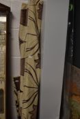Two Dunelm mill blinds having beige ground with taupe and crimson tulip pattern.