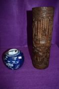 A hand decorated Chinese export ginger jar and similar carved bamboo brush pots