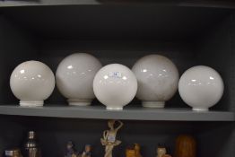 A selection of milk or opal glass light shades various sizes