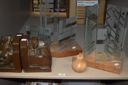 A pair of abstract oak book ends, and two lots of decorative glass and similar.