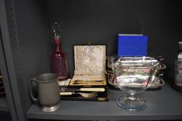 A selection of fine dinner wares including lidded serving dishes boxed cutlery and decanter