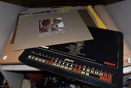 A good selection of Pirelli and similar erotic calendars