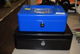 Two lockable cash boxes.