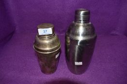 Two art deco cocktail shakers one silver plated and one chrome